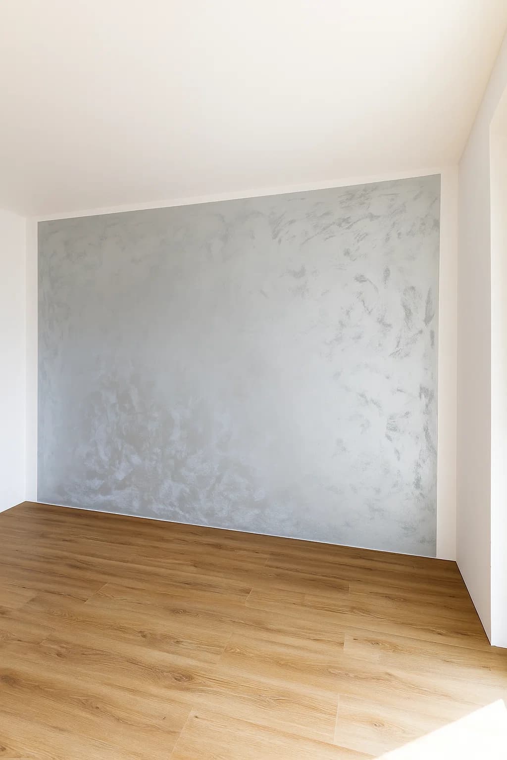 Šedá dekorativní stěrka Luxury v obývacím pokoji